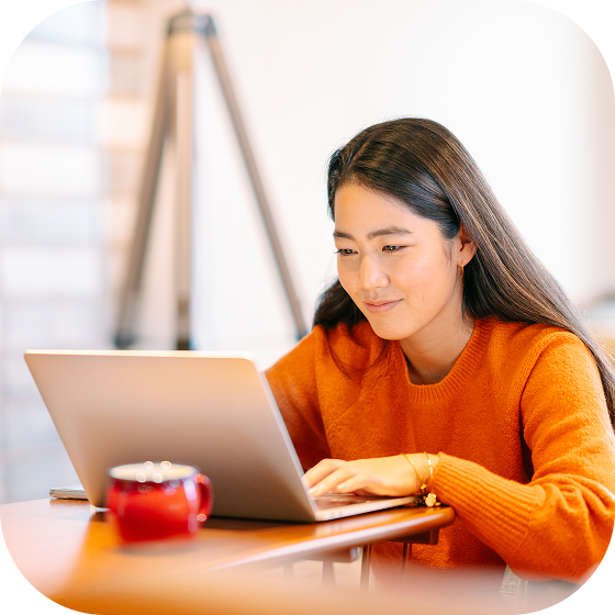 Woman looking at a laptop