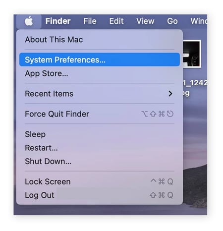 Abra el menú de Apple y haga clic en Preferencias del Sistema
