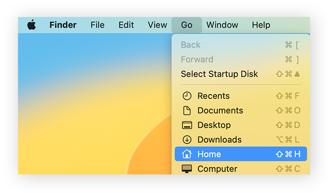 Finder mit geöffnetem Menü „Gehe zu“ und ausgewähltem Benutzerordner.