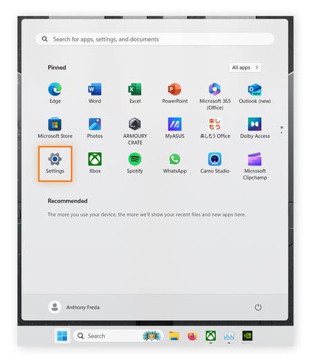 O menu de início está aberto e a opção Configurações está realçada.