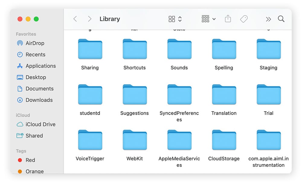 Dragging a Library folder related to a deleted malicious app on Mac.