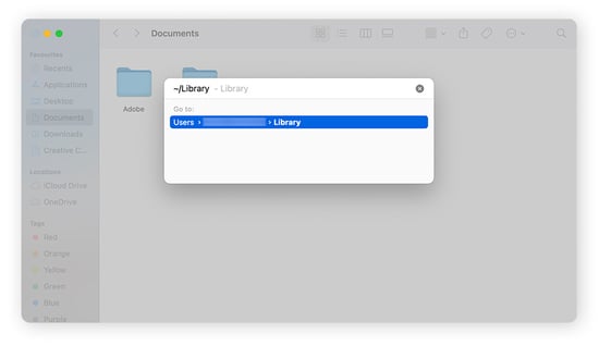 Abrir la carpeta Biblioteca desde la barra de búsqueda Ir a la carpeta en macOS Sonoma.